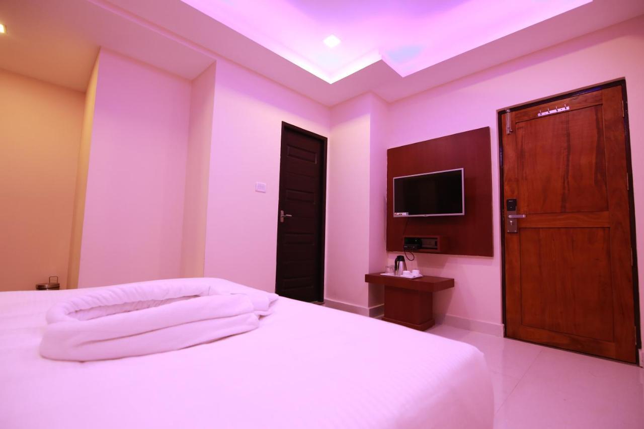 Hotel Apple Suites บังกาลอร์ ภายนอก รูปภาพ
