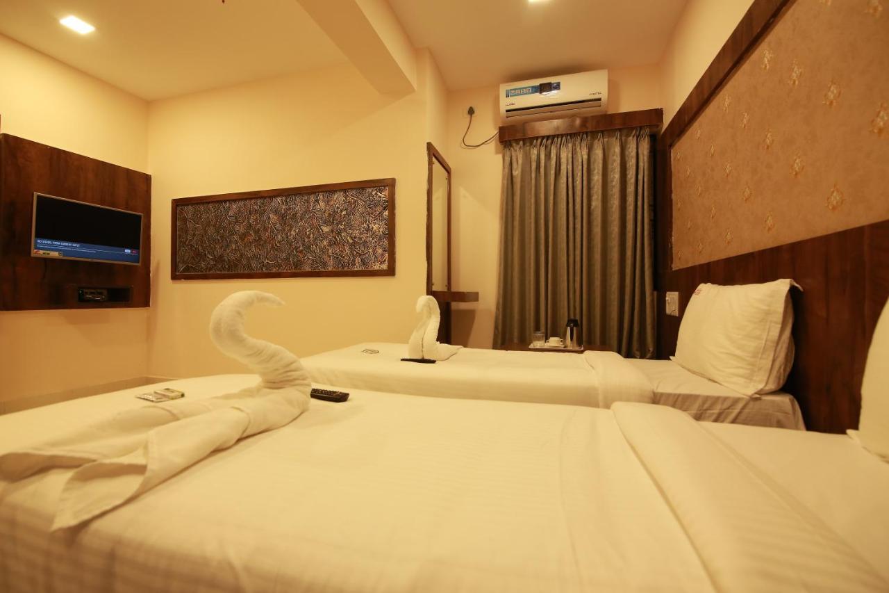 Hotel Apple Suites บังกาลอร์ ภายนอก รูปภาพ